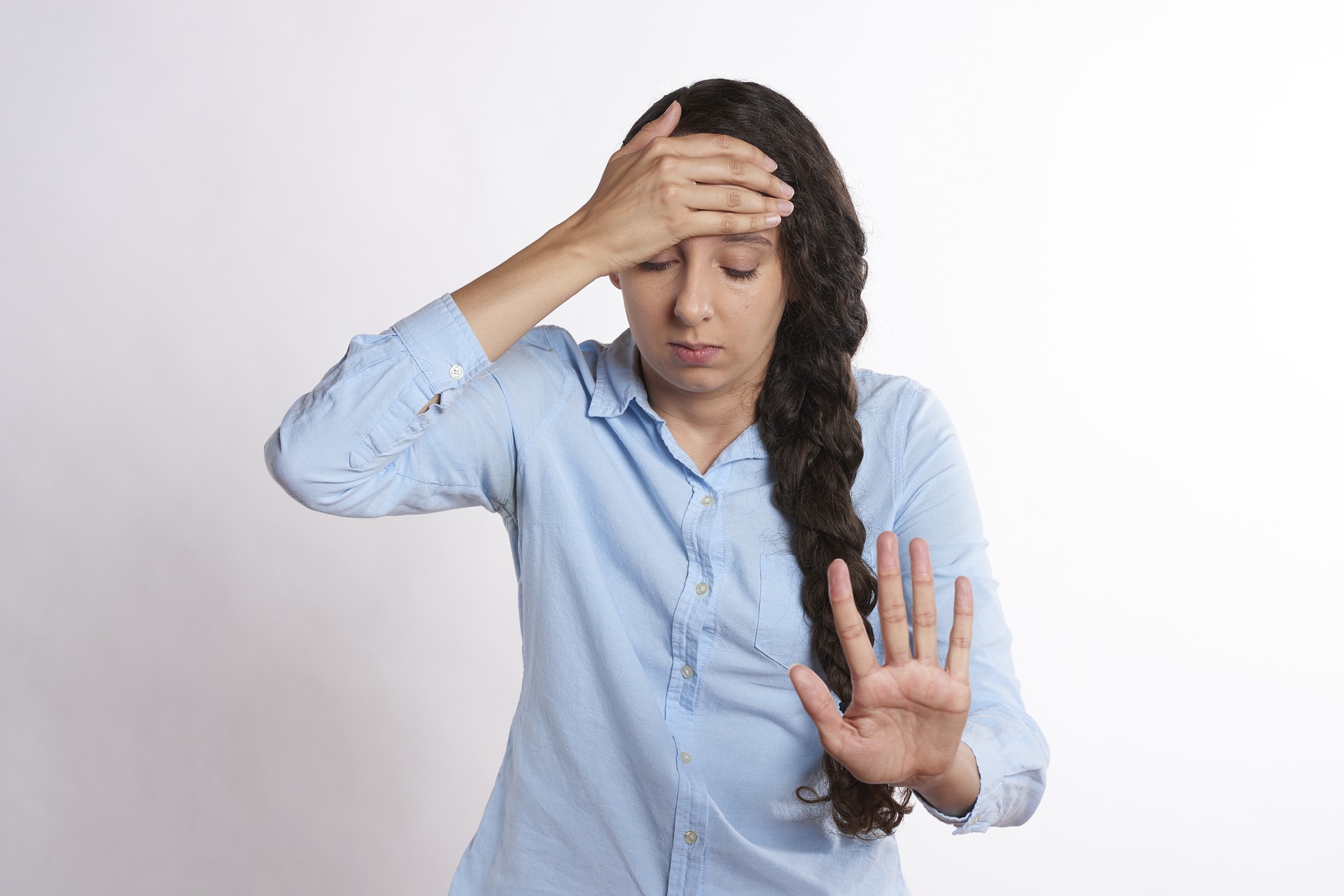 overwhelmed woman experiencing stress