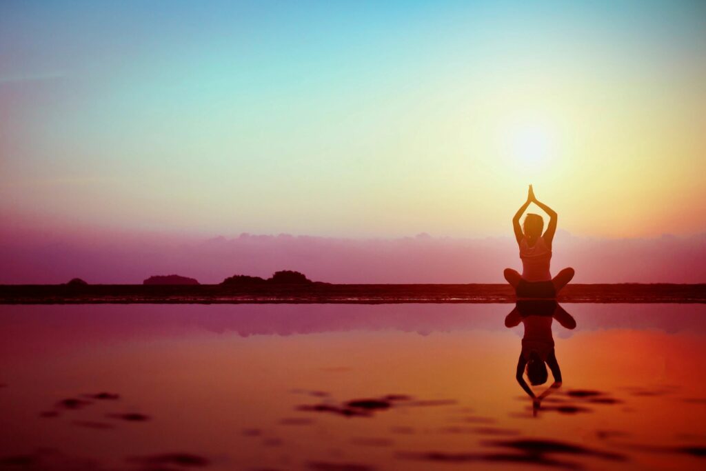 yoga on the beach with refection