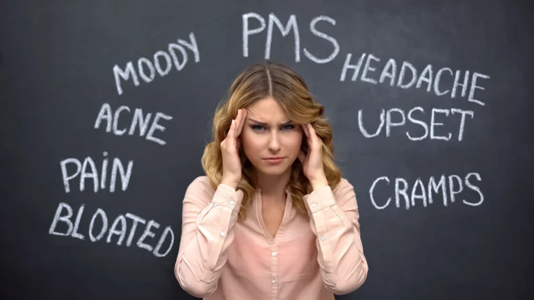 Woman suffering headache due to imaginary problems in pms
